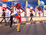 Российский хоккейный болельщик с флагом Российской Федерации